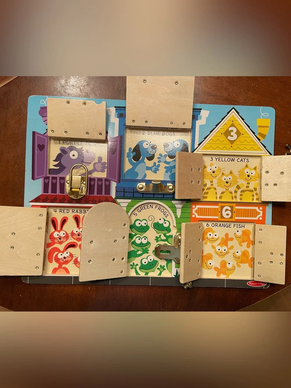 Melissa & Doug Baby/Toddler Lock Board Puzzle—colors and counting